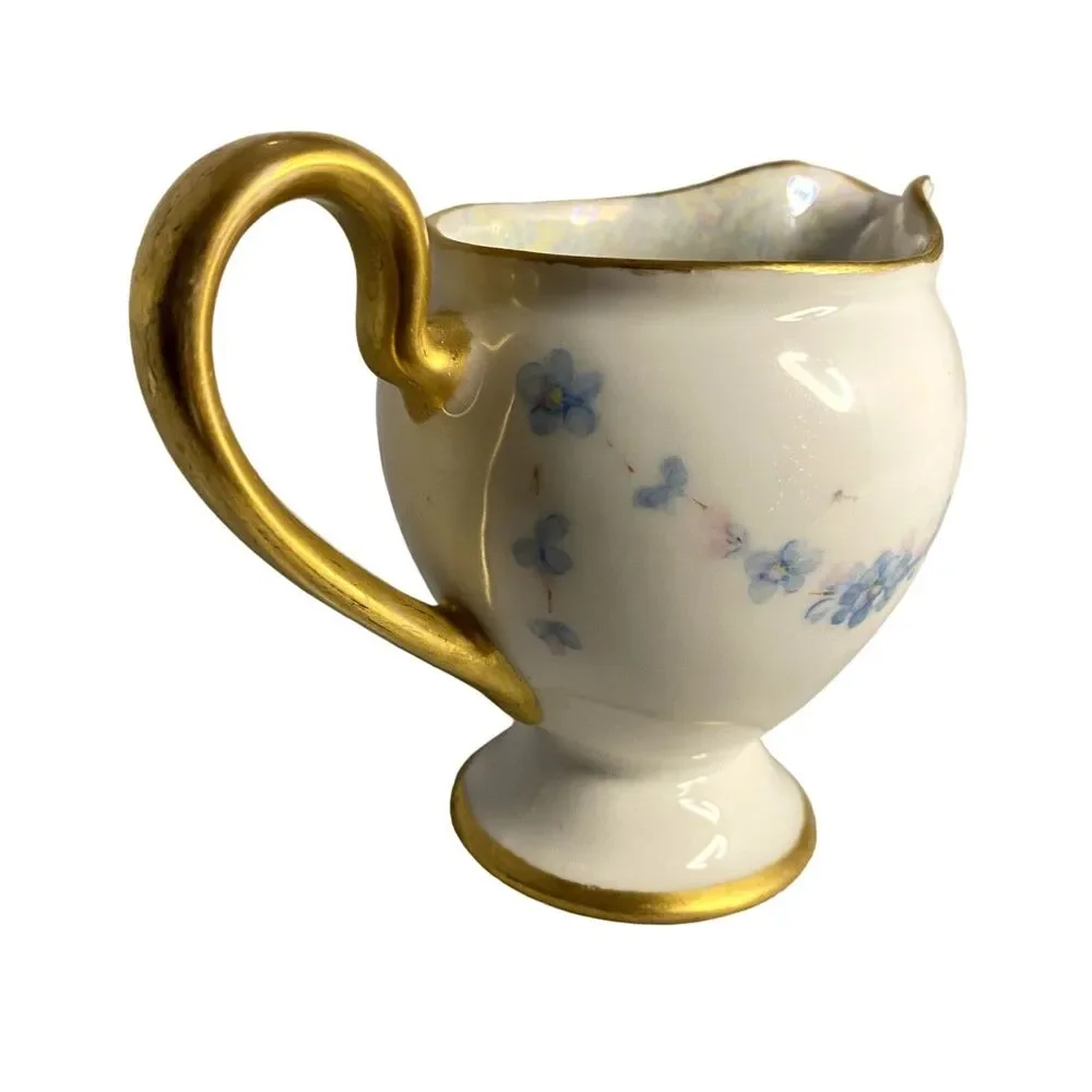 #8191 VINTAGE MADE IN JAPAN SUGAR BOWL AND CREAMER WITH LIGHT BLUE FLOWERS